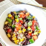 This delicious corn and black bean quinoa salad and nutritious salad can be eaten alone, as a side dish, in a wrap or in a salad with lettuce. Add chicken for some extra protein, avocado for some healthy fats or enjoy as is! #quinoasalad #saladrecipe #saladsforlunch