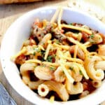 This Instant Pot Beef Casserole uses fresh and flavorful ingredients, which give it a lovely, refreshing quality. It’s hearty and filling, but the flavors of oregano and garlic add a lilting lightness to this dish. #instantpot recipe #beefcasserole #easydinner #pasta #beef