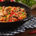Say yes to this simple one pot jambalaya recipe, perfect for an easy meal your whole family will love! #easydinner #onepotmeal #jambalya #healthydinner #dinnerinspiration