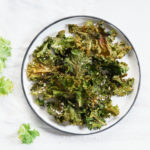 You won't be able to get enough of these yummy Oven Roasted Kale Chips! Healthy, Easy, and SO delicious!
