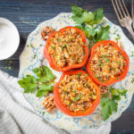 Walnut Quinoa Stuffed Peppers combines three nutritional superfoods: Bell Peppers, Quinoa and Walnuts. Stuffed peppers work great as a stand-alone lunch dish or as a side dish. The combination of textures – juicy pepper, soft quinoa, crunchy walnuts and gooey melted cheese really make for an enjoyable eating experience.