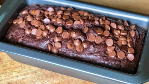 This Double Chocolate Banana Bread recipe is a super moist variation of the classic banana bread recipe. Loaded with chocolate chips, this is CRAZY good!!
