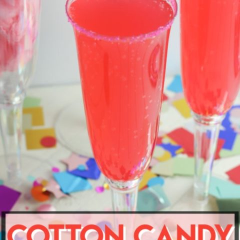 Two slushy cotton candy mocktails in tall stemmed glasses.