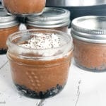 Close up of Mini Instant Pot Chocolate Cheesecake in a mini mason jar.