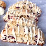 Close up of White Chocolate Cranberry Almond Biscotti on a baking sheet
