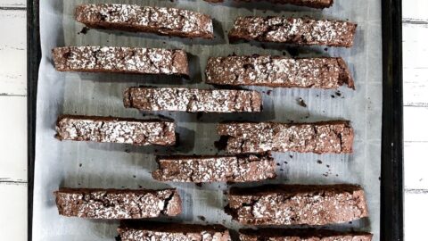 Double chocolate biscotti on a baking sheet lined with parchment paper