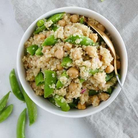 Snap Pea Quinoa Salad 1 - Let’s go keen-wah crazy with this tasty round-up of easy quinoa salad recipes to take to your next potluck! These delicious quinoa salad recipes are gloriously gluten-free with lots of vegetarian options too.