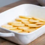 Cooking scalloped potatoes recipe with organic potatoes.