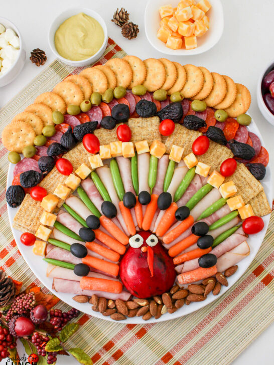 Cute Turkey Charcuterie for Christmas or Thanksgiving 14 - This fun turkey charcuterie board adds a playful and festive twist to your Christmas or Thanksgiving holiday gatherings. It's a delightful conversation starter and a creative way to enjoy classic holiday flavors. Plus, it's perfect for all ages, making it a crowd-pleaser that will have everyone smiling and munching away.