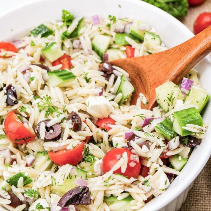 Greek Orzo Salad 17 - Discover 21 vibrant salads perfect for your Fourth of July celebration! From patriotic fruit salads to zesty coleslaws, elevate your holiday spread with fresh flavors.