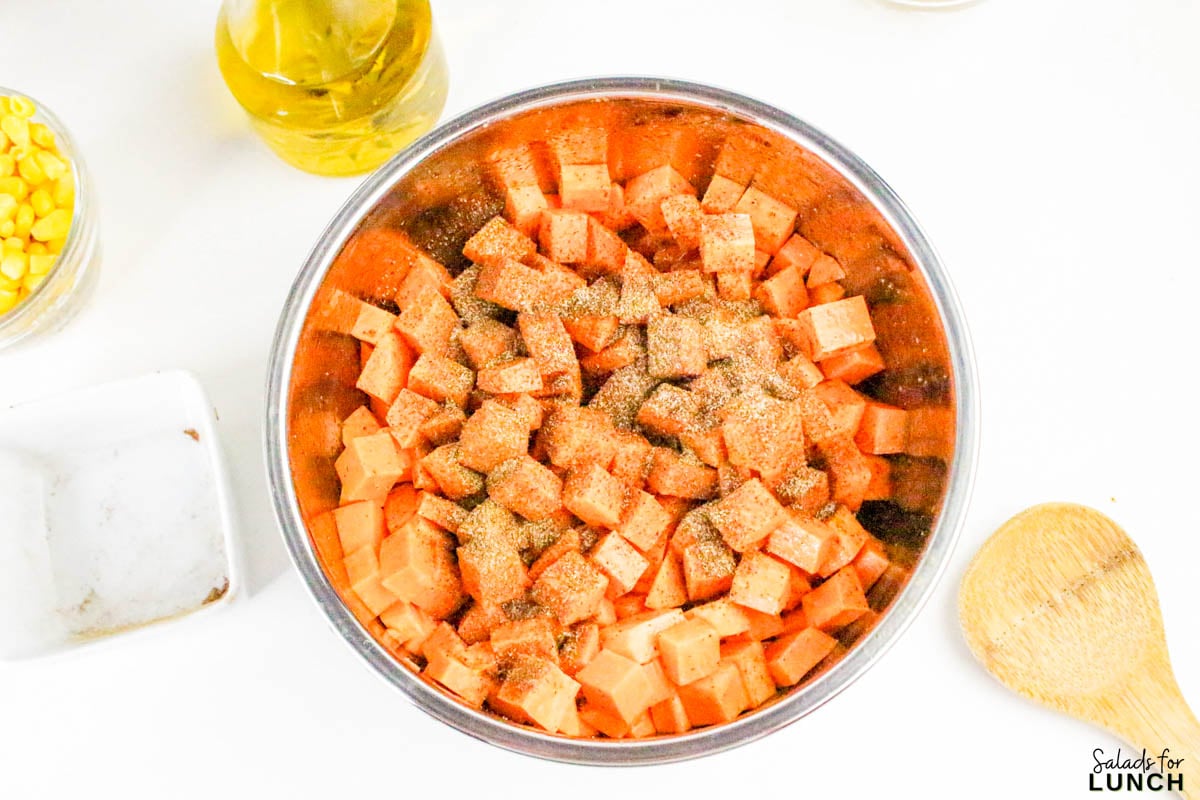 Southwestern Sweet Potato Salad 4 - This easy Southwestern Sweet Potato Salad is full of bright, bold flavors and cozy roasted sweet potatoes that’ll keep you coming back for more. It’s got all the Tex-Mex goodness—corn, black beans, red pepper, cilantro, and a zippy lime dressing that ties everything together. Whether you serve it warm or chill it for later, it makes a tasty and healthy salad that’s perfect for meal prep, picnics, or potlucks.
