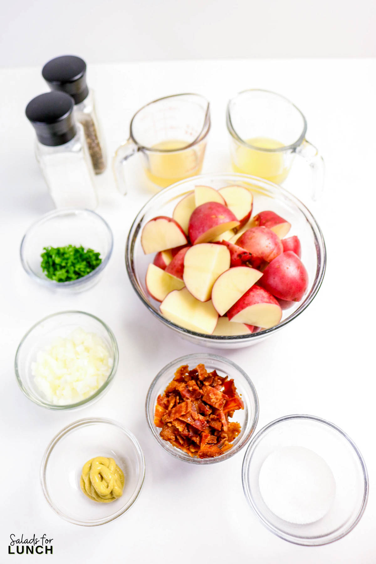 Warm German Potato Salad Recipe 1 - Make this easy Warm German Potato Salad with Bacon for a tangy, hearty, and comforting side dish! An authentic German potato salad recipe that’s perfect for weeknight dinners, potlucks, or a make-ahead salad.