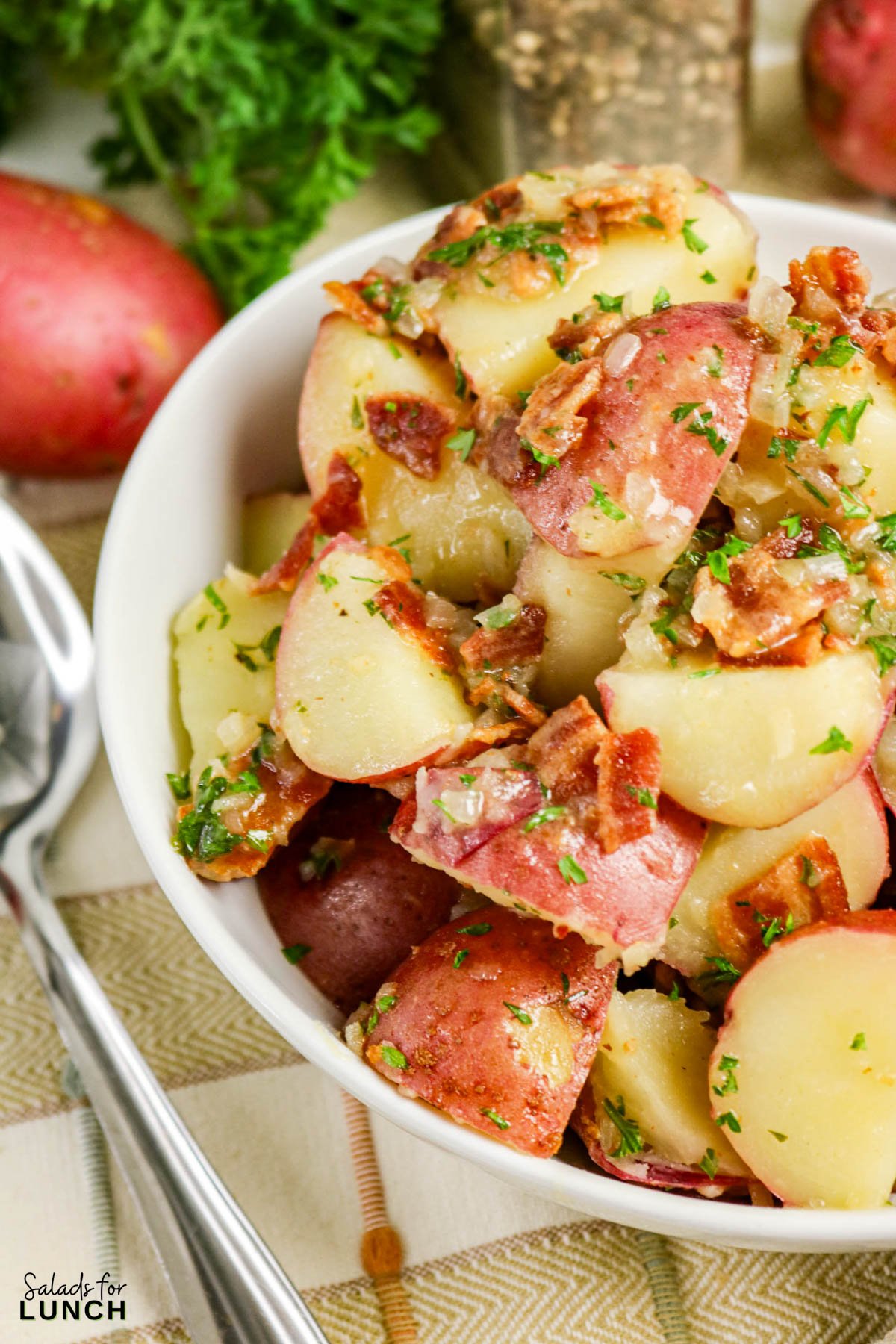 Warm German Potato Salad Recipe 17 - Make this easy Warm German Potato Salad with Bacon for a tangy, hearty, and comforting side dish! An authentic German potato salad recipe that’s perfect for weeknight dinners, potlucks, or a make-ahead salad.