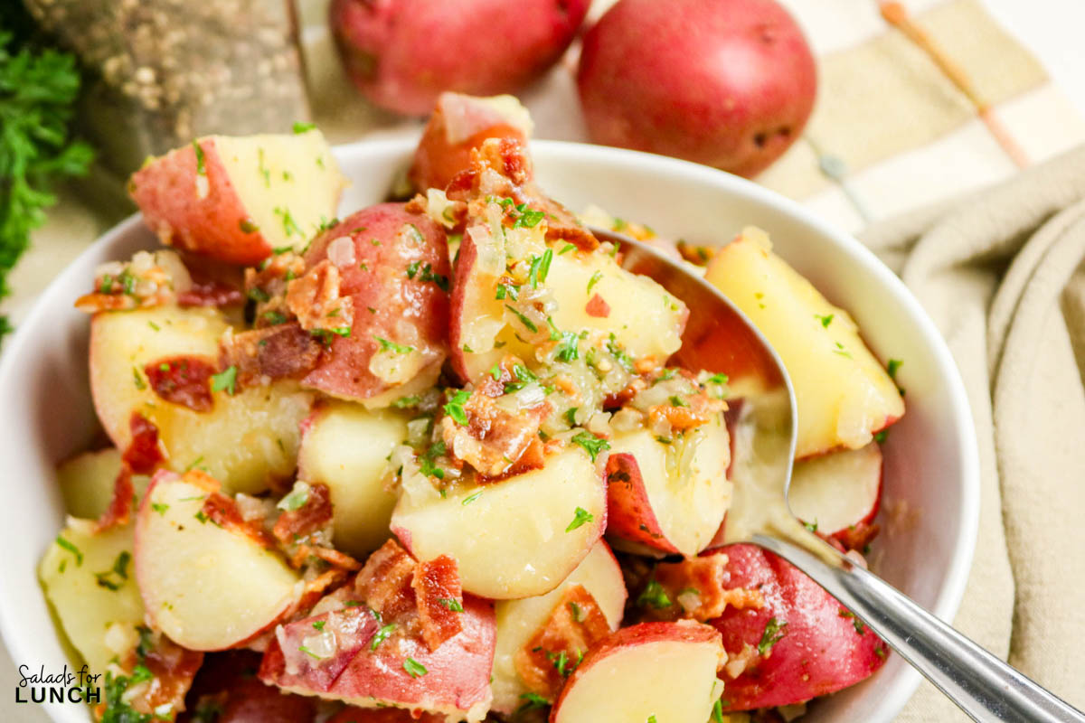 Warm German Potato Salad Recipe 22 - Make this easy Warm German Potato Salad with Bacon for a tangy, hearty, and comforting side dish! An authentic German potato salad recipe that’s perfect for weeknight dinners, potlucks, or a make-ahead salad.
