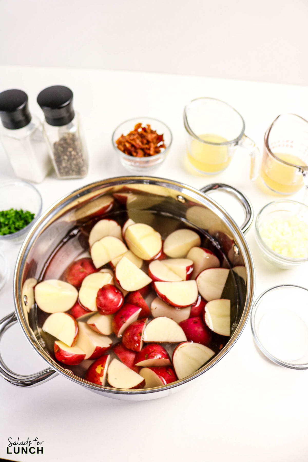 Warm German Potato Salad Recipe 4 - Make this easy Warm German Potato Salad with Bacon for a tangy, hearty, and comforting side dish! An authentic German potato salad recipe that’s perfect for weeknight dinners, potlucks, or a make-ahead salad.