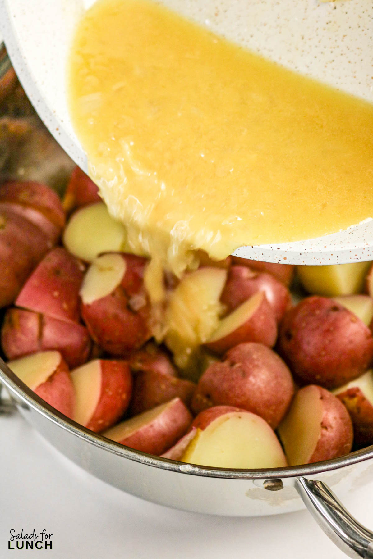 Warm German Potato Salad Recipe 9 - Make this easy Warm German Potato Salad with Bacon for a tangy, hearty, and comforting side dish! An authentic German potato salad recipe that’s perfect for weeknight dinners, potlucks, or a make-ahead salad.