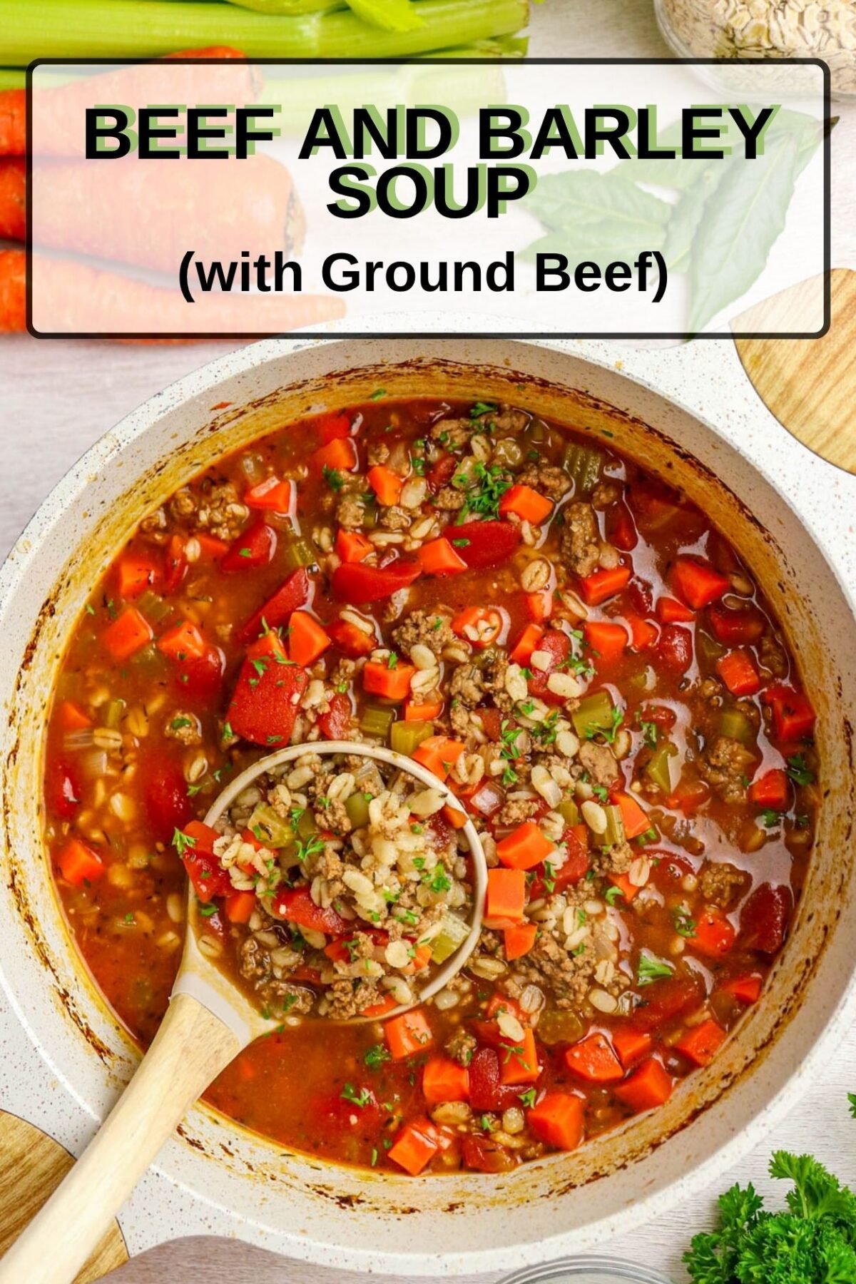 Beef and Barley Soup with Ground Beef - Beef and Barley Soup with Ground Beef 1 Close up of Beef and Barley Soup with Ground Beef in a white pot with a wooden spoon in it.