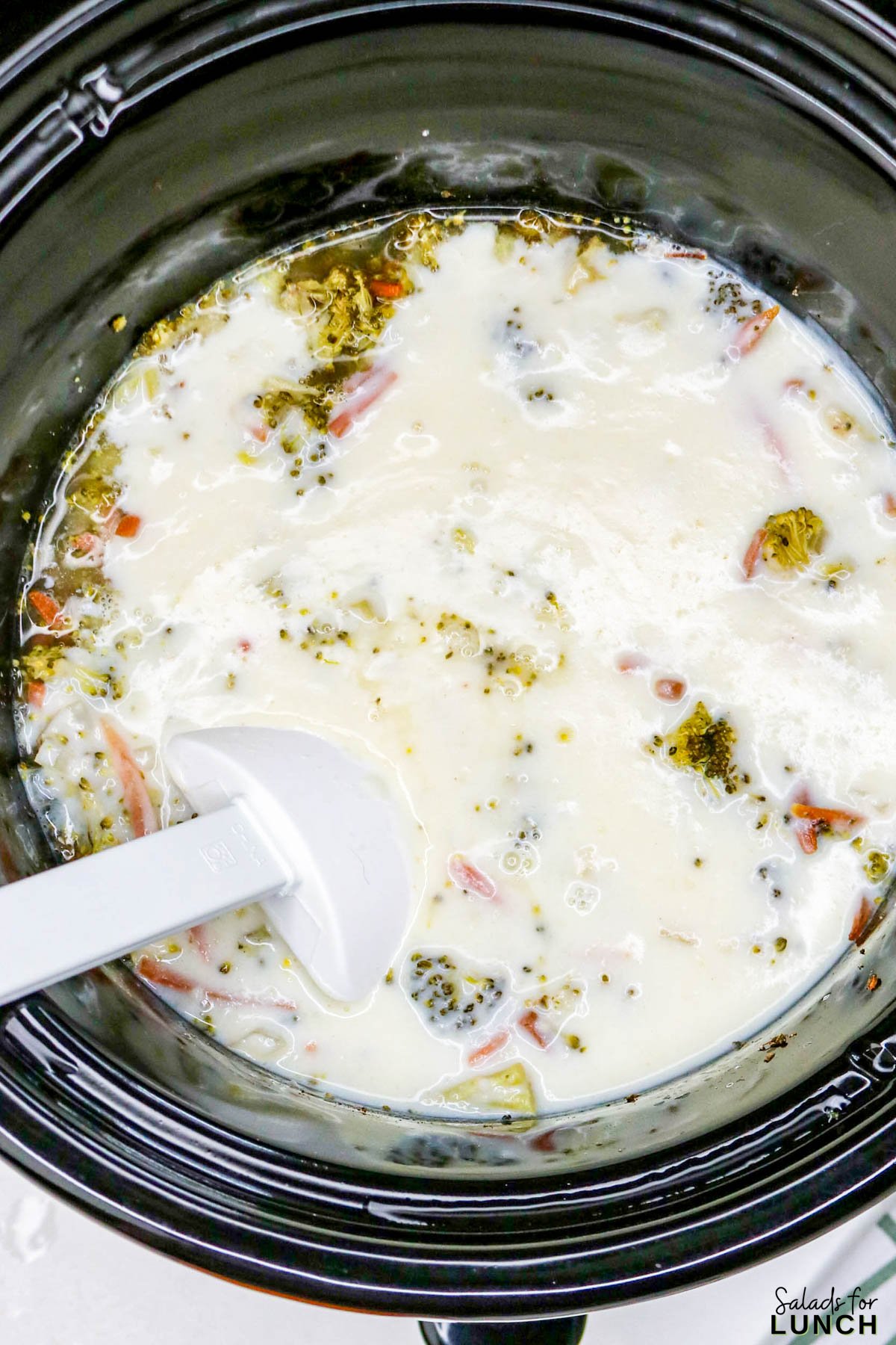 Easy Slow Cooker Broccoli Cheddar Soup - Slow Cooker Broccoli Cheddar Soup Recipe 12 Slow Cooker Broccoli Cheddar Soup Recipe 12 - A warm, cheesy bowl of comfort that practically cooks itself โ yes, please! This Healthy Broccoli Cheddar Soup is creamy, cozy, and full of flavor. Itโs one of those meals that fills your kitchen with the most amazing aroma while the slow cooker does all the heavy lifting. Perfect for chilly nights, this Broccoli Cheddar Soup Slow Cooker recipe tastes like your favorite cafรฉ version (hello, Copycat Panera Broccoli Cheddar Soup), but with a wholesome homemade twist.