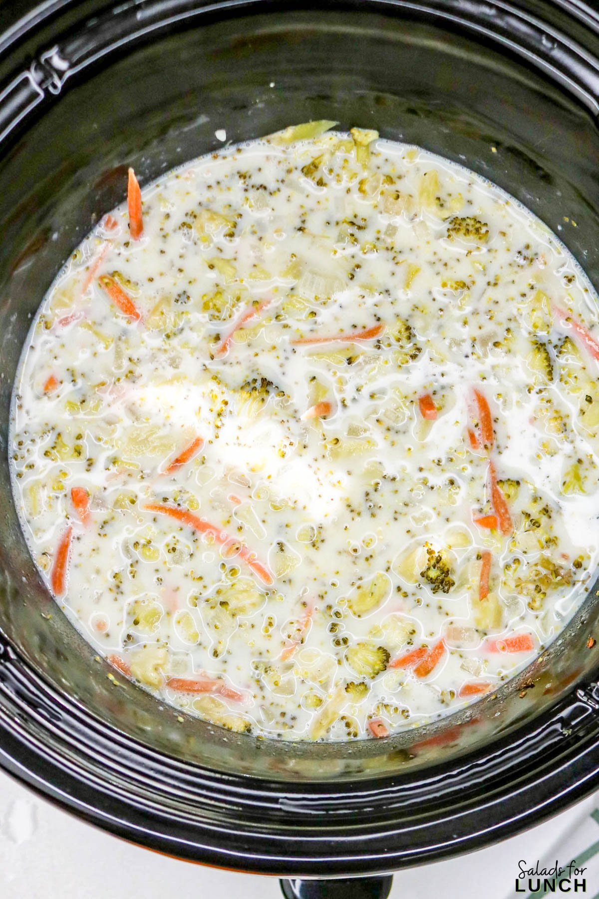 Easy Slow Cooker Broccoli Cheddar Soup - Slow Cooker Broccoli Cheddar Soup Recipe 13 Slow Cooker Broccoli Cheddar Soup Recipe 13 - A warm, cheesy bowl of comfort that practically cooks itself โ yes, please! This Healthy Broccoli Cheddar Soup is creamy, cozy, and full of flavor. Itโs one of those meals that fills your kitchen with the most amazing aroma while the slow cooker does all the heavy lifting. Perfect for chilly nights, this Broccoli Cheddar Soup Slow Cooker recipe tastes like your favorite cafรฉ version (hello, Copycat Panera Broccoli Cheddar Soup), but with a wholesome homemade twist.