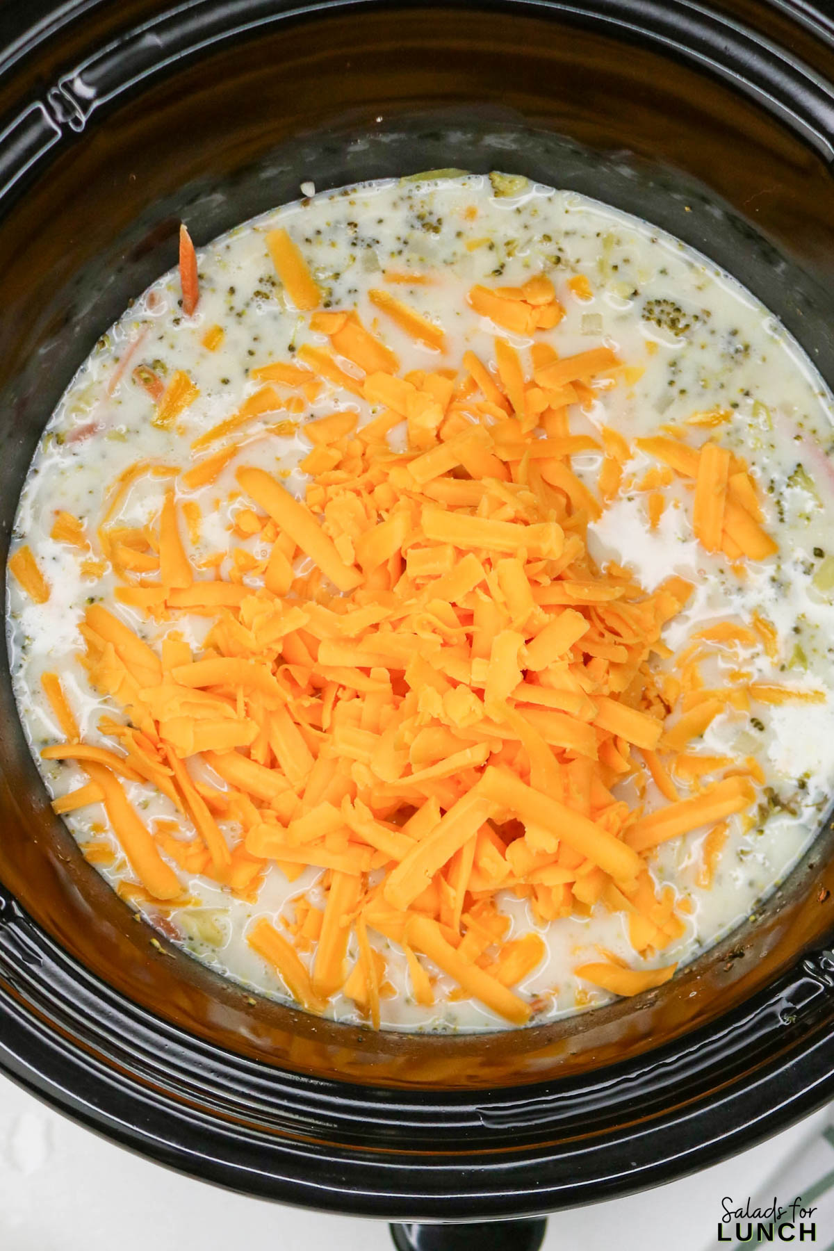 Easy Slow Cooker Broccoli Cheddar Soup - Slow Cooker Broccoli Cheddar Soup Recipe 14 Slow Cooker Broccoli Cheddar Soup Recipe 14 - A warm, cheesy bowl of comfort that practically cooks itself โ yes, please! This Healthy Broccoli Cheddar Soup is creamy, cozy, and full of flavor. Itโs one of those meals that fills your kitchen with the most amazing aroma while the slow cooker does all the heavy lifting. Perfect for chilly nights, this Broccoli Cheddar Soup Slow Cooker recipe tastes like your favorite cafรฉ version (hello, Copycat Panera Broccoli Cheddar Soup), but with a wholesome homemade twist.