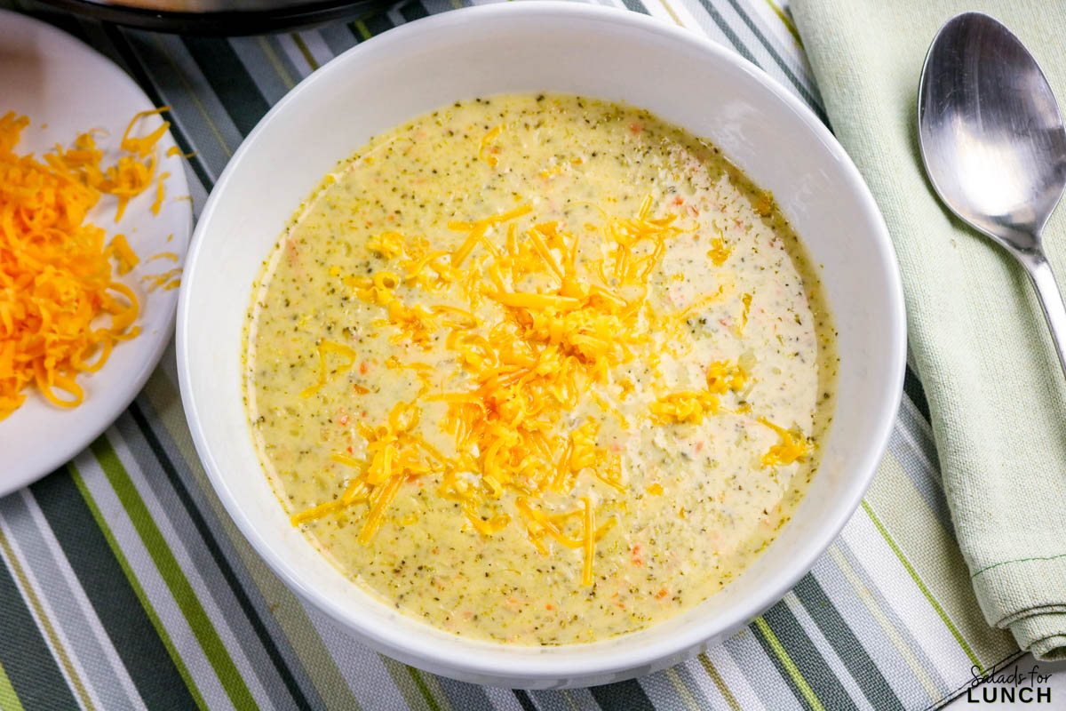 Easy Slow Cooker Broccoli Cheddar Soup - Slow Cooker Broccoli Cheddar Soup Recipe 22 Slow Cooker Broccoli Cheddar Soup Recipe 22 - A warm, cheesy bowl of comfort that practically cooks itself โ yes, please! This Healthy Broccoli Cheddar Soup is creamy, cozy, and full of flavor. Itโs one of those meals that fills your kitchen with the most amazing aroma while the slow cooker does all the heavy lifting. Perfect for chilly nights, this Broccoli Cheddar Soup Slow Cooker recipe tastes like your favorite cafรฉ version (hello, Copycat Panera Broccoli Cheddar Soup), but with a wholesome homemade twist.