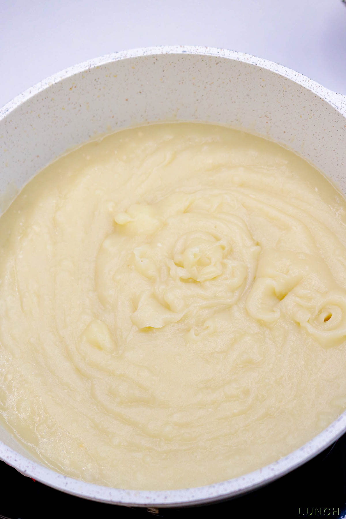 Cheesy Potato Soup Recipe 10 - When the weather turns chilly and you start craving something cozy, this Cheesy Potato Soup comes to the rescue with creamy comfort in every spoonful. It’s loaded with soft potatoes, melty cheddar, and all the flavors that make a cold evening feel instantly better. This simple potato soup recipe has become a go-to for anyone wanting a hearty meal without a lot of fuss.