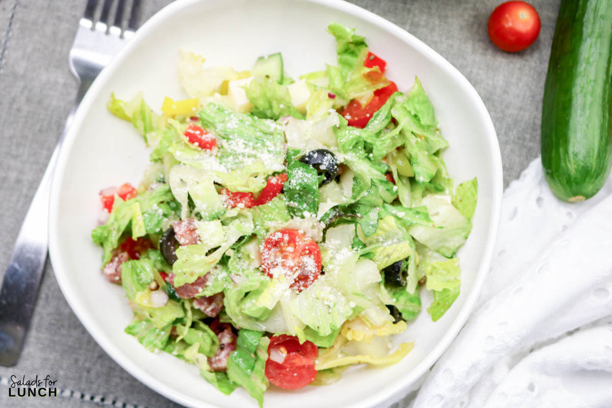 Italian Chopped Salad Recipe 27 1 - If you’re craving something crisp, colorful, and loaded with flavor, this Italian Chopped Salad Recipe is about to become a new go-to. It’s packed with crunchy veggies, savory meats, creamy cheese, and a zesty homemade dressing that ties everything together. It works as an Easy Italian Chopped Salad, a quick lunch, or the most refreshing sidekick to a cozy pasta night.