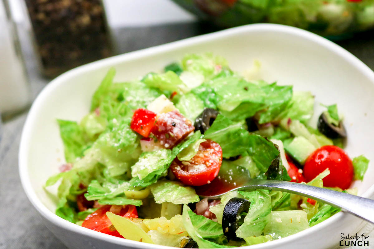 Italian Chopped Salad Recipe 33 - If you’re craving something crisp, colorful, and loaded with flavor, this Italian Chopped Salad Recipe is about to become a new go-to. It’s packed with crunchy veggies, savory meats, creamy cheese, and a zesty homemade dressing that ties everything together. It works as an Easy Italian Chopped Salad, a quick lunch, or the most refreshing sidekick to a cozy pasta night.