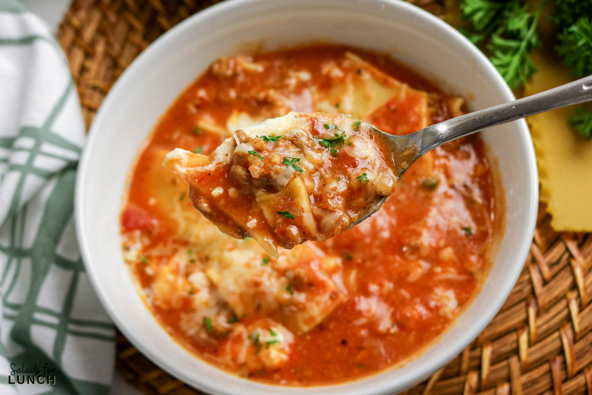 Easy Lasagna Soup Recipe 31 - Slow Cooker Lasagna Soup takes everything you crave about classic lasagna and turns it into a cozy, spoonable dinner. Think rich tomato broth, tender pasta pieces, savory meat, and melty cheese in every bite—without layering noodles or babysitting the oven. The slow cooker does the heavy lifting, making this a perfect weeknight dinner for chilly days.