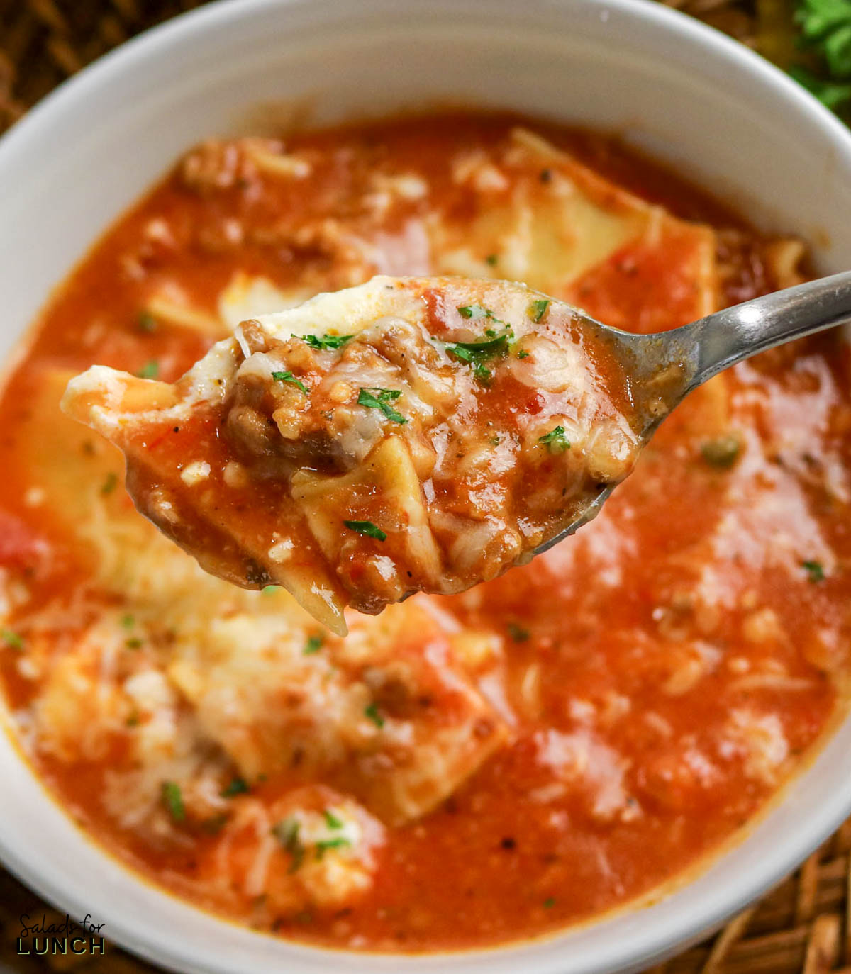 Easy Lasagna Soup Recipe 32 - Slow Cooker Lasagna Soup takes everything you crave about classic lasagna and turns it into a cozy, spoonable dinner. Think rich tomato broth, tender pasta pieces, savory meat, and melty cheese in every bite—without layering noodles or babysitting the oven. The slow cooker does the heavy lifting, making this a perfect weeknight dinner for chilly days.
