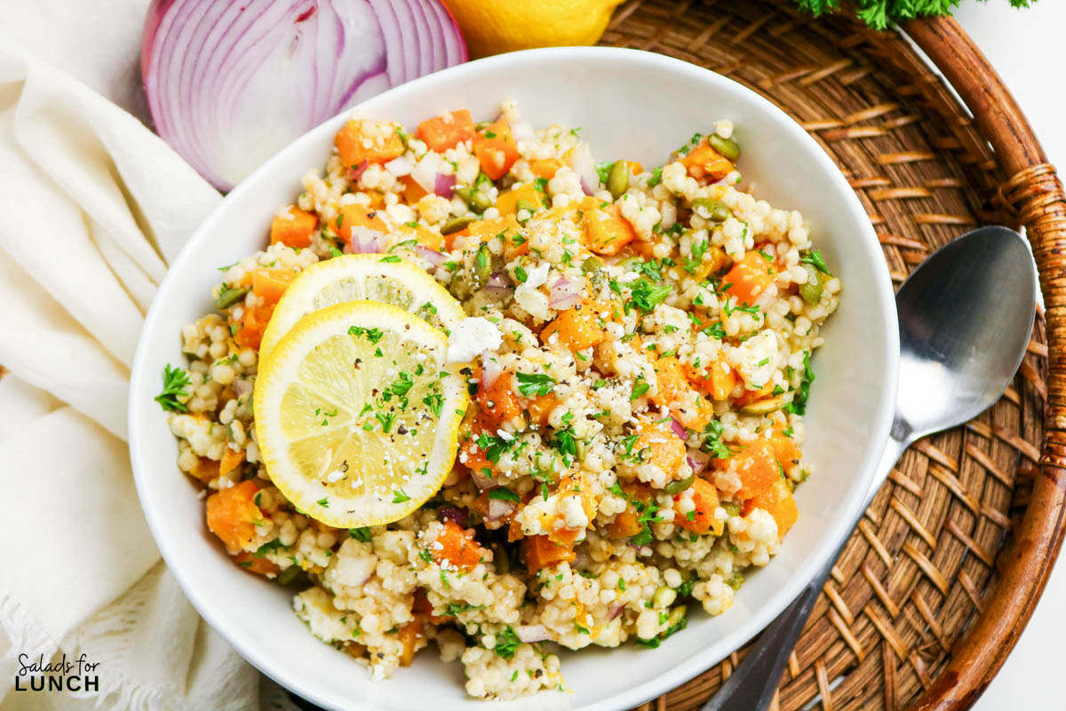 Roasted Pumpkin Couscous Salad in a white bowl.