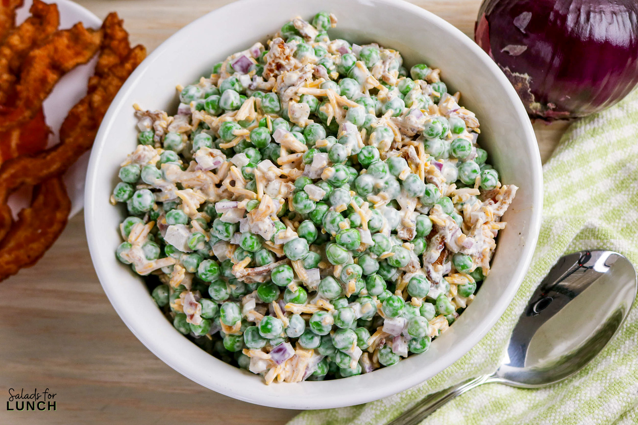 Classic Pea Salad with Bacon and Cheese (No Mayo) - Pea Salad Recipe No Mayo 07 Pea Salad Recipe No Mayo 07 - Say goodbye to heavy, overly-mayo-laden recipes, and say hello to this bright, light, and flavor-packed Classic Pea Salad. This isn’t your grandmother’s creamy classic (although we love hers too!); this version uses a light, tangy sour cream-based dressing that makes every spoonful feel fresh and wonderful. It’s the simple, cold side dish that perfectly complements any grilled chicken or baked fish.