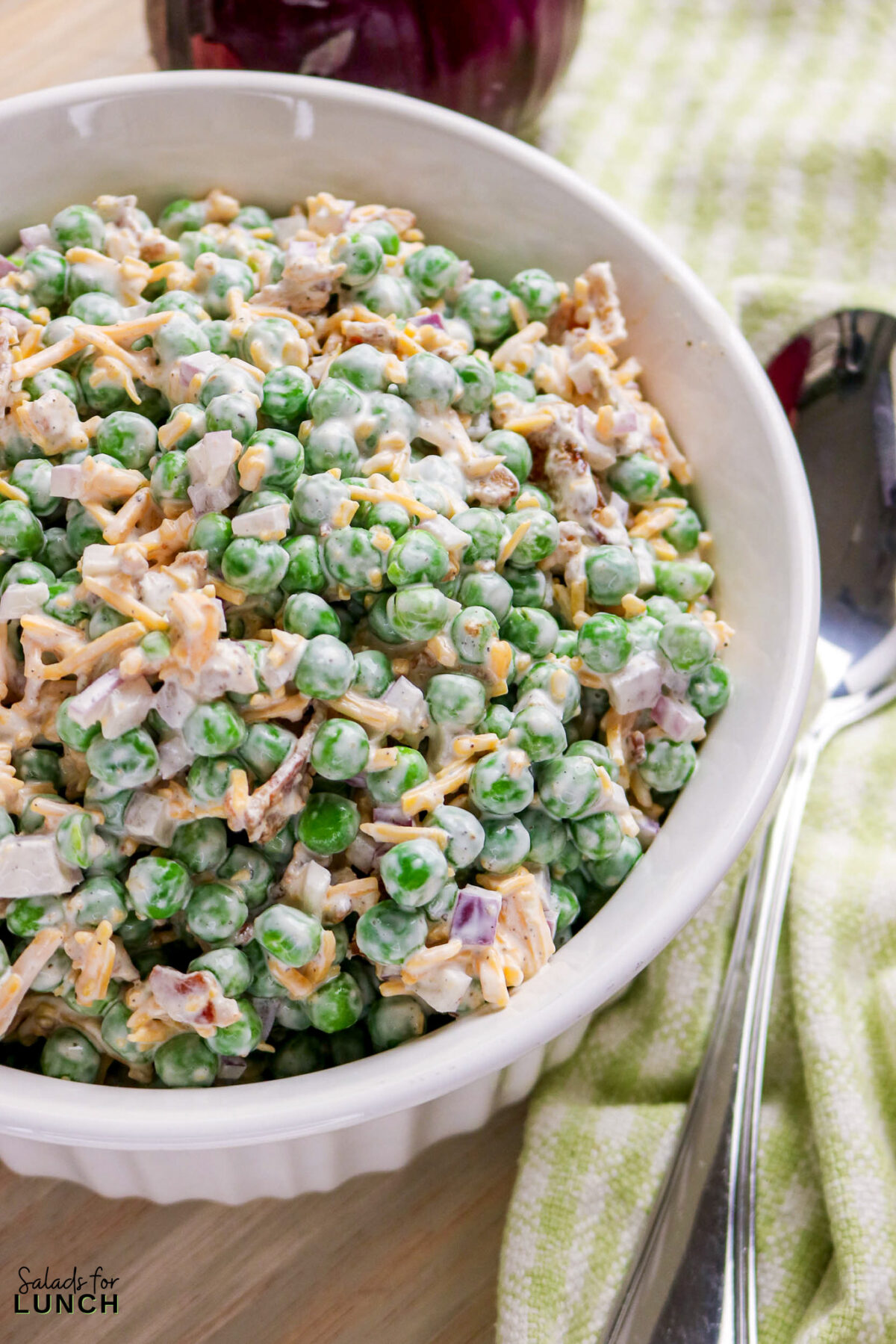 Classic Pea Salad with Bacon and Cheese (No Mayo) - Pea Salad Recipe No Mayo 09 Pea Salad Recipe No Mayo 09 - Say goodbye to heavy, overly-mayo-laden recipes, and say hello to this bright, light, and flavor-packed Classic Pea Salad. This isn’t your grandmother’s creamy classic (although we love hers too!); this version uses a light, tangy sour cream-based dressing that makes every spoonful feel fresh and wonderful. It’s the simple, cold side dish that perfectly complements any grilled chicken or baked fish.