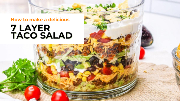 7 Layer Taco Salad Recipe: A delicious layered salad in a clear bowl.