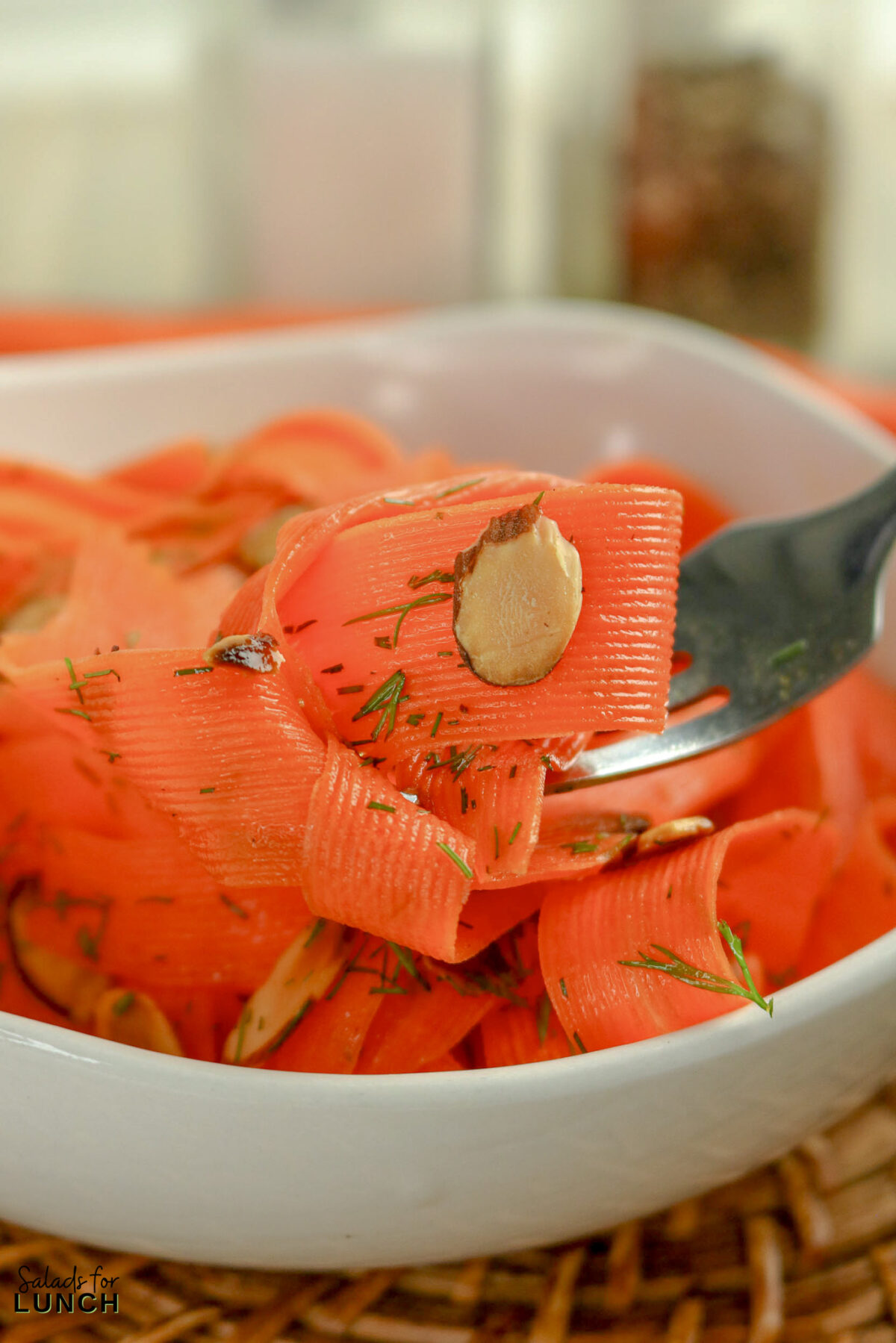 Carrot Ribbon Salad (Fresh & Crunchy Carrot Salad for Spring) - Carrot Ribbon Salad Recipe 05 Carrot Ribbon Salad Recipe 05 - If you’re looking for a fresh, colorful side that comes together in minutes, this Carrot Ribbon Salad is about to be your new go-to. Thinly shaved carrots tossed in a light lemon-honey dressing create the perfect balance of crisp texture and bright flavor. It’s simple, beautiful, and exactly the kind of salad that makes everyday meals feel a little more special.