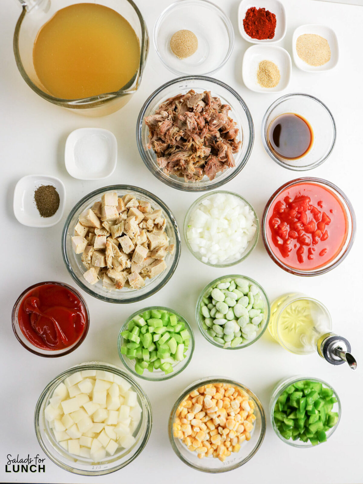 Brunswick stew ingredients: chicken, pork, corn, potatoes, tomatoes, broth, and spices ready for an easy one pot soup.