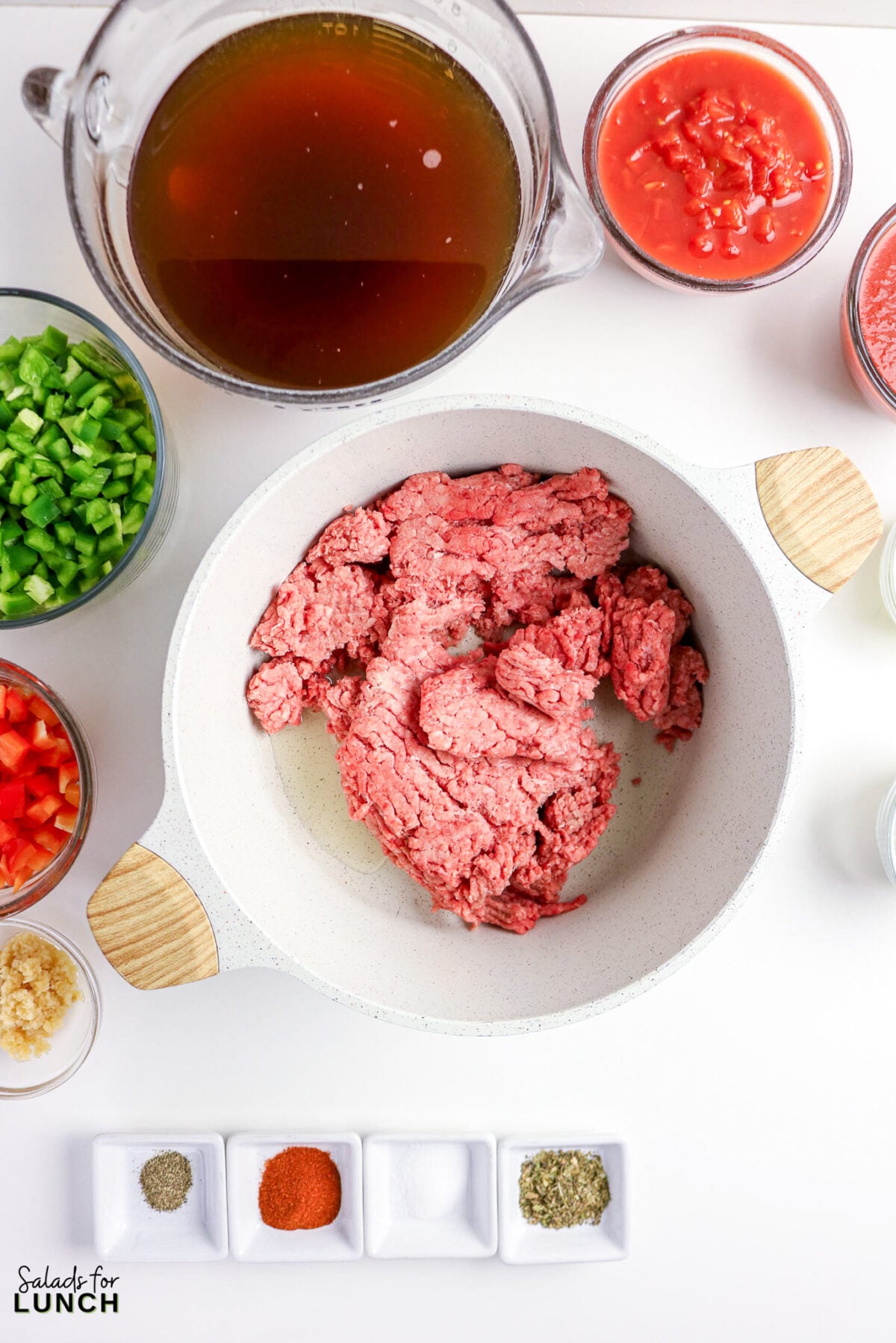 Stuffed Pepper Soup ingredients: ground beef, peppers, tomatoes, broth, and spices.