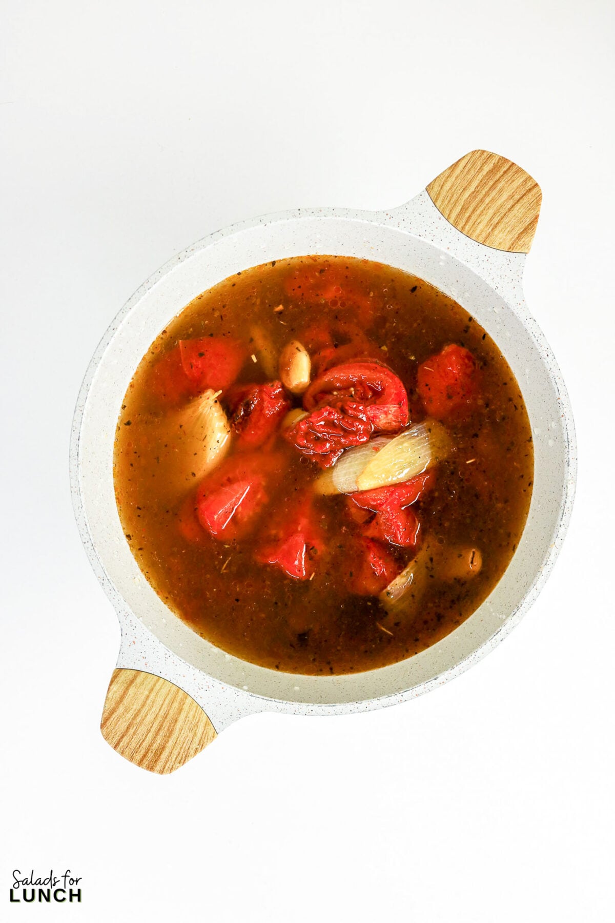 Roasted Tomato and Basil Soup Process 08 - Sweet roasted vine-ripened tomatoes, garlic, and onions create a rich, flavorful soup that's finished with fresh basil for a bright, garden-fresh taste. This easy homemade soup is delicious with a grilled cheese sandwich or a slice of crusty bread.
