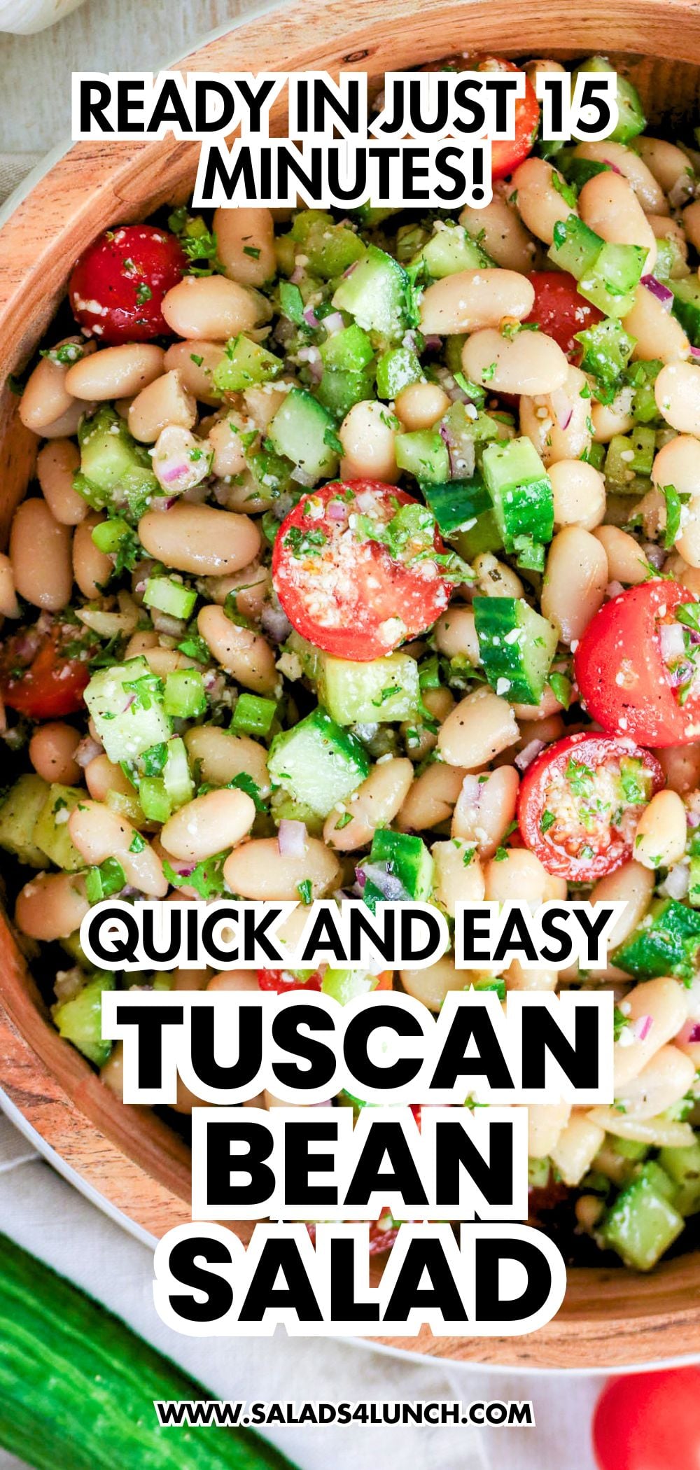 Easy Tuscan Bean Salad - Easy Tuscan Bean Salad Recipe Quick and easy Tuscan Bean Salad ready in just 15 minutes, with white beans, cherry tomatoes, cucumber, and herbs in a wooden bowl.