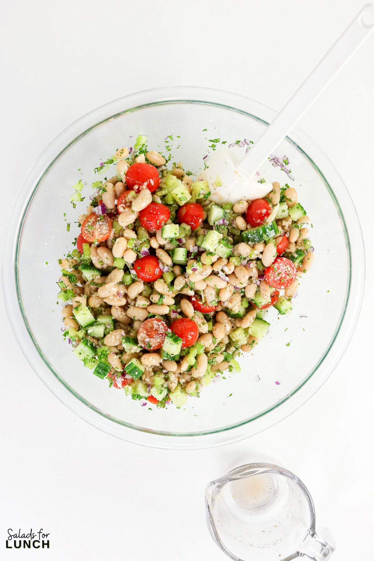 Easy Tuscan Bean Salad - Tuscan Bean Salad Process 3 Tuscan Bean Salad Process 3 - This easy Tuscan bean salad tosses creamy cannellini beans, crisp veggies, and a bright lemon-herb dressing together in 15 minutes — a make-ahead side that's ready when you are.