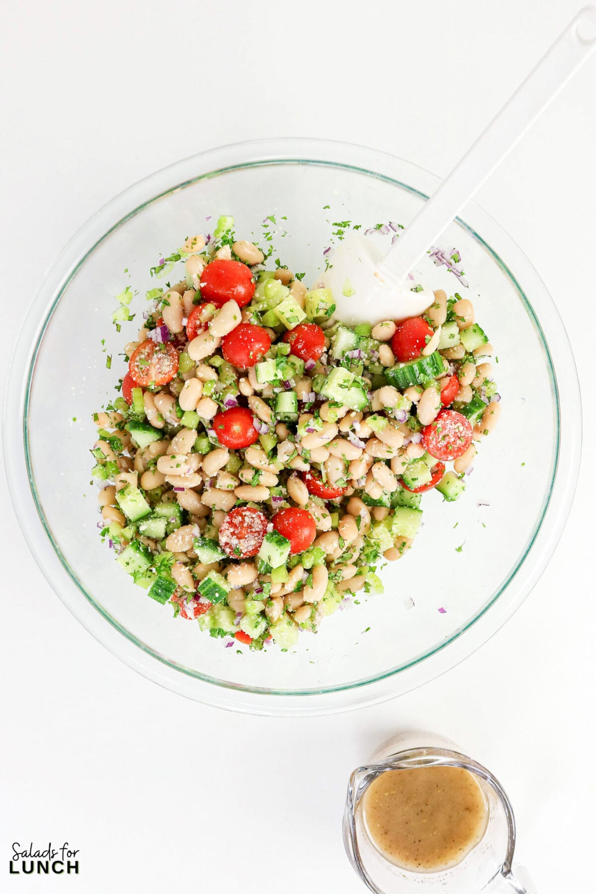 Easy Tuscan Bean Salad - Tuscan Bean Salad Process 4 Tuscan Bean Salad Process 4 - This easy Tuscan bean salad tosses creamy cannellini beans, crisp veggies, and a bright lemon-herb dressing together in 15 minutes — a make-ahead side that's ready when you are.