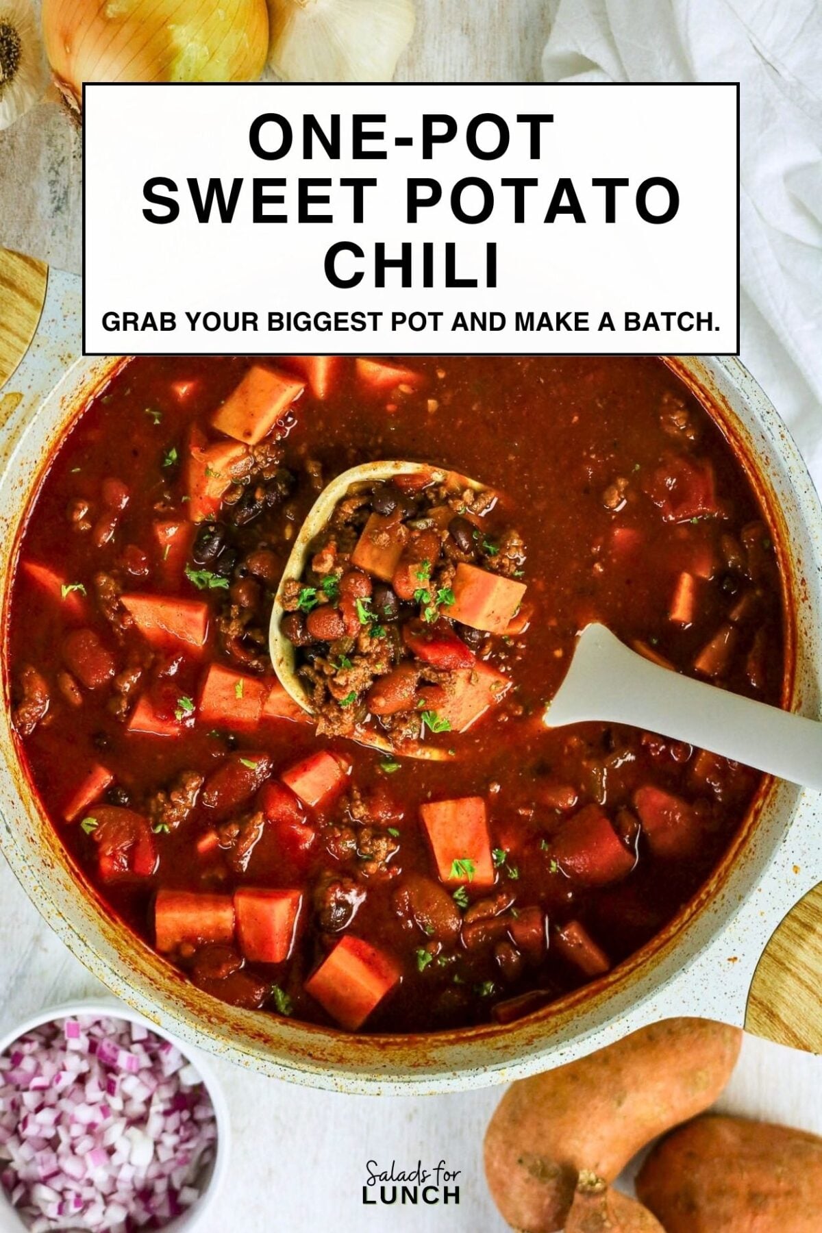 Healthy Sweet Potato Chili with Ground Beef - One Pot Sweet Potato Soup One-Pot Sweet Potato Chili: a pot of chili with sweet potatoes, ground beef, and black beans, ladled up, surrounded by diced onion and whole sweet potatoes.