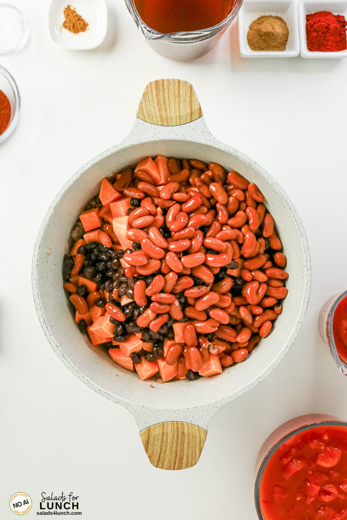 Healthy Sweet Potato Chili with Ground Beef - Sweet Potato Chili Process 07 Sweet Potato Chili Process 07 - This healthy sweet potato chili with ground beef is an easy one-pot dinner loaded with sweet potatoes, black beans, kidney beans and smoky spices. Hearty, freezer-friendly and even better the next day.