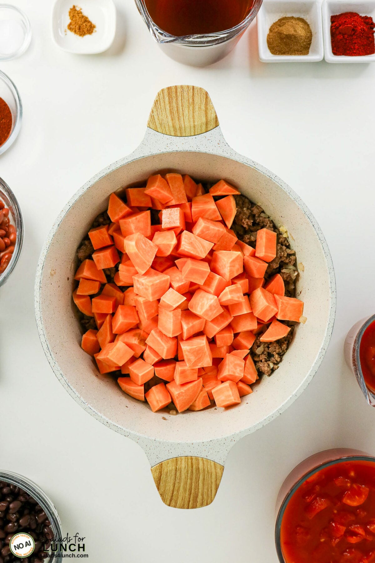 Healthy Sweet Potato Chili with Ground Beef - Sweet Potato Chili Process 09 Sweet Potato Chili Process 09 - This healthy sweet potato chili with ground beef is an easy one-pot dinner loaded with sweet potatoes, black beans, kidney beans and smoky spices. Hearty, freezer-friendly and even better the next day.