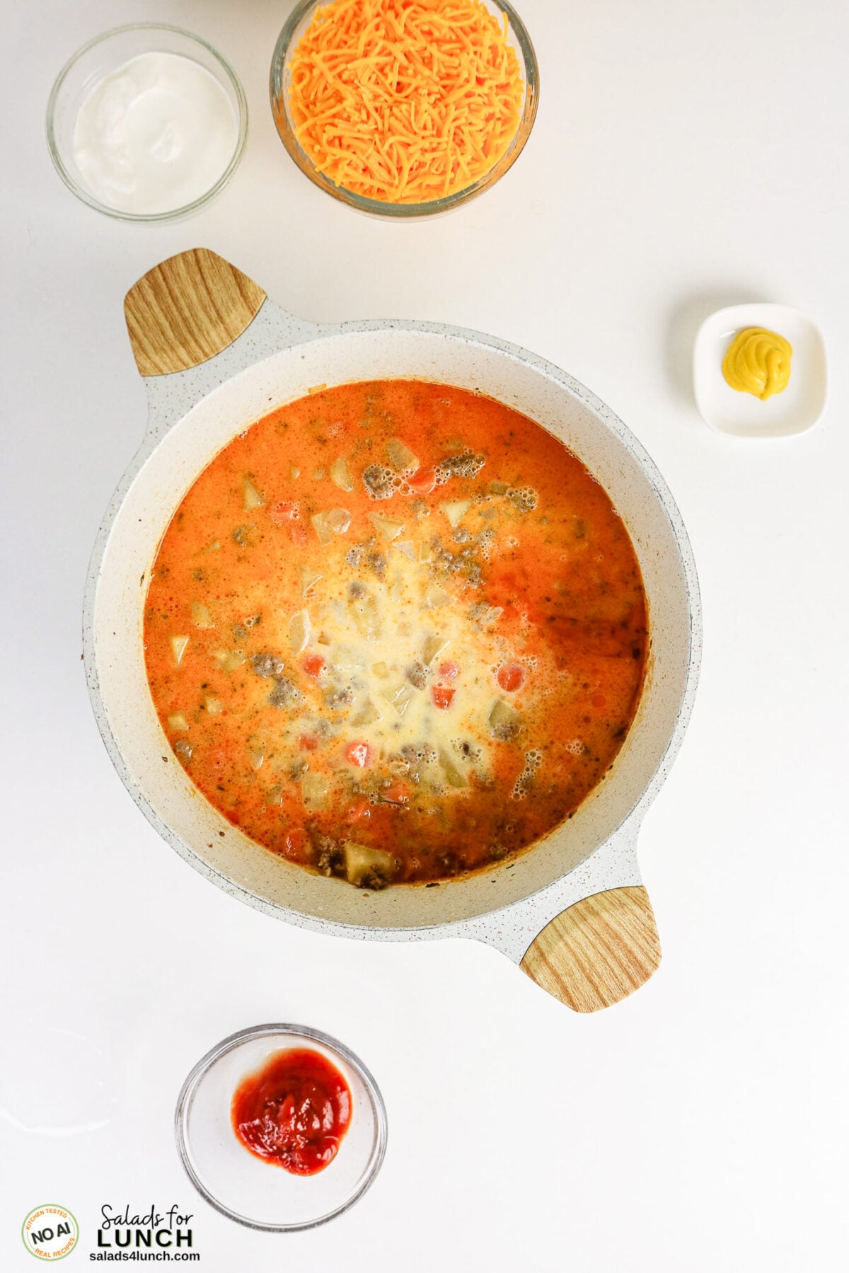 Easy Cheeseburger Soup Recipe - Cheeseburger Soup Recipe Process 06 Cheeseburger Soup Recipe Process 06 - This easy cheeseburger soup has all the flavours of a classic cheeseburger in a creamy, comforting one-pot soup. Ground beef, potatoes, carrots and sharp cheddar make it hearty enough for a cozy weeknight dinner.